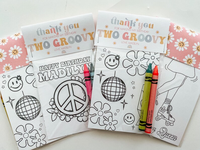 May include: Three colourful thank you cards with a groovy theme. The cards feature a peace sign, a disco ball, and a girl on roller skates. The cards are decorated with daisies and hearts. The text on the cards reads "Thank you for making my birthday two groovy." and "Love Madilyn".
