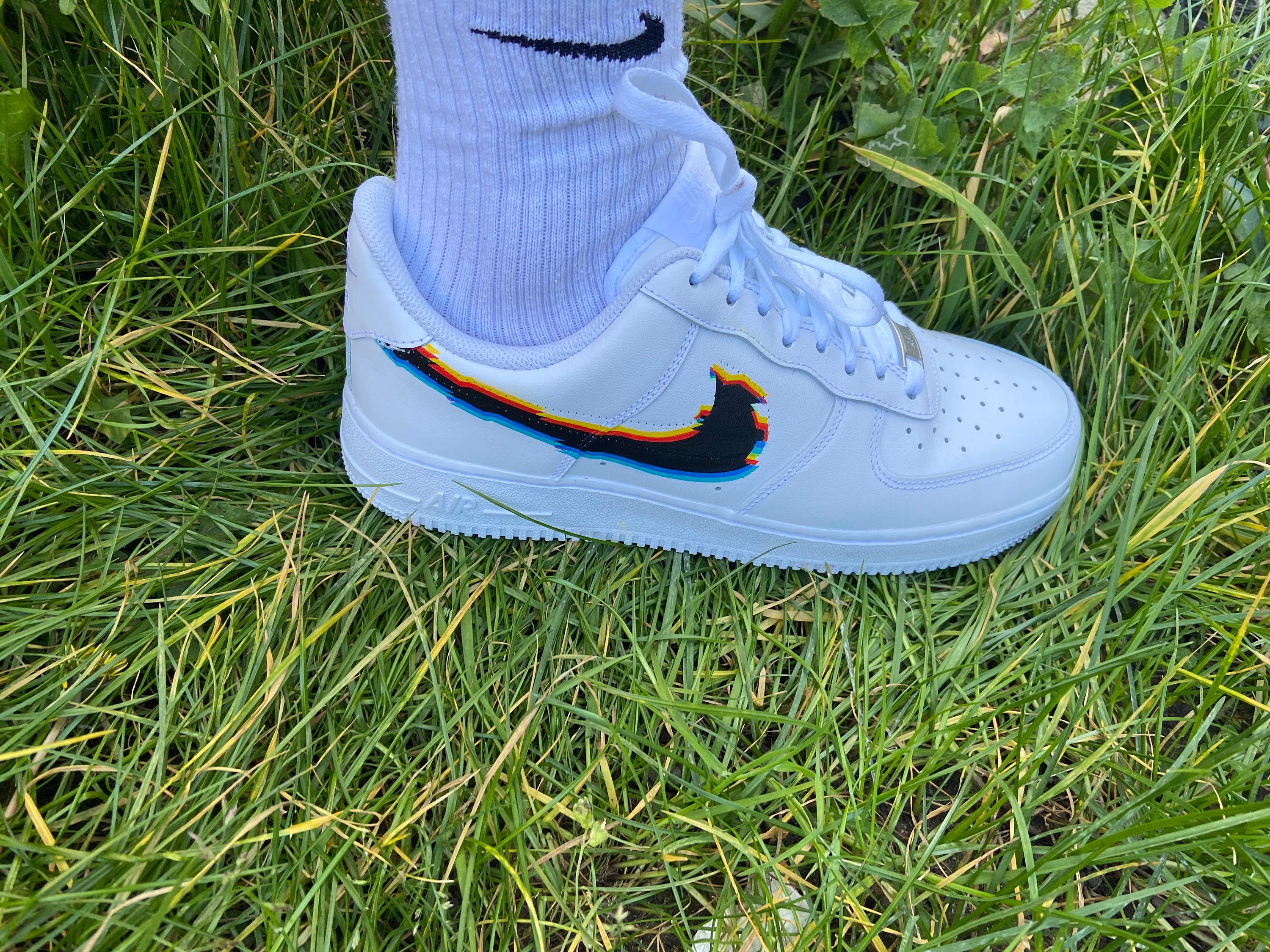 white air force with neon tick