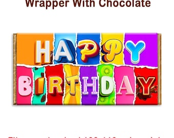 Può includere: Un involucro di cioccolato colorato con le parole "Happy Birthday" in un divertente font multicolore. L'involucro è progettato per adattarsi a una barretta di cioccolato standard da 100-110 g.