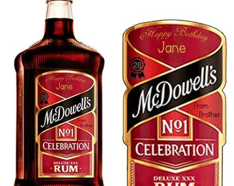 May include: A red and gold bottle of McDowell's No. 1 Celebration Deluxe XXX Rum with a personalized label that says "Happy Birthday Jane" and "From Brother".