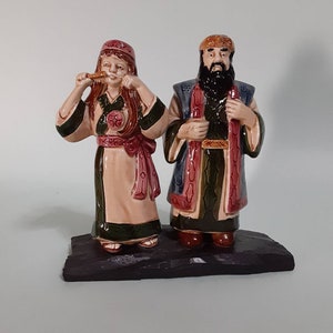 Ceramic statues of ainu couple