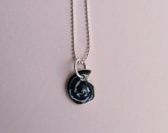 Ceramic necklace seashell with silver-plated necklace.