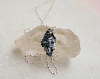 Ceramic necklace seashell with silver-plated necklace.
