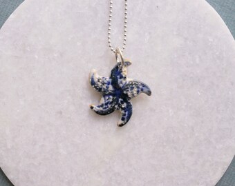 Ceramic necklace seastar with silver-plated necklace.