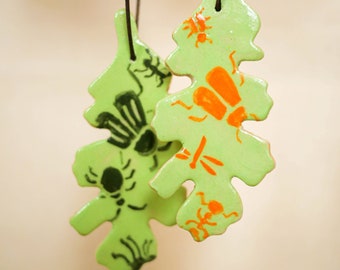 Hand-painted ceramic Christmas hanger set from leaves with different bugs