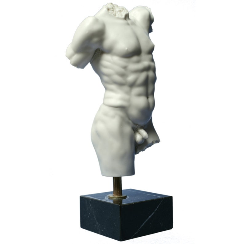 May include: White marble sculpture of a male torso on a black marble base.