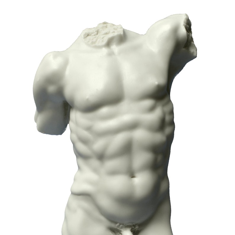May include: White plaster sculpture of a male torso with a broken arm. The sculpture is detailed with muscle definition and a smooth finish.