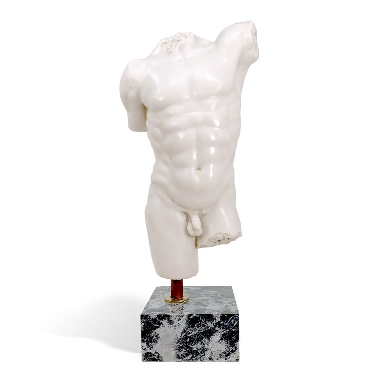 May include: White marble sculpture of a headless male torso on a black marble base.