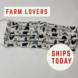May include: White face mask with a black and white farm animal print. The print includes pigs, chickens, cows, and barns. The text "FARM LOVERS" is at the top of the image and "SHIPS TODAY" is at the bottom of the image.