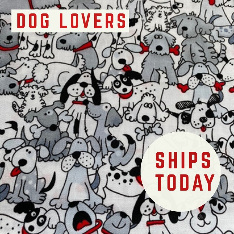 May include: A white fabric with a black and white pattern of various dog breeds. The text "DOG LOVERS" is at the top of the image. The text "SHIPS TODAY" is in a white circle with a red border.