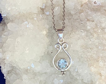 facetted aquamarine pendant set with sterling silver