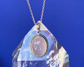 Rose quartz pendant set with sterling silver