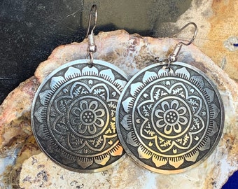 Light round mandala earrings silver color