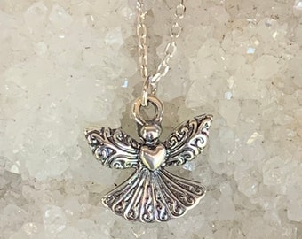 Angel pendant made with sterling silver gardian angel