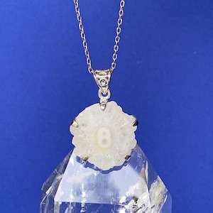 Solar quartz pendant set with sterling silver, crystal points