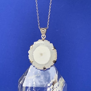 Solar quartz pendant set with sterling silver, natural crystals