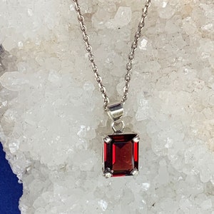 Garnet pendant set with sterling silver faceted natural red stone, rectangular shape