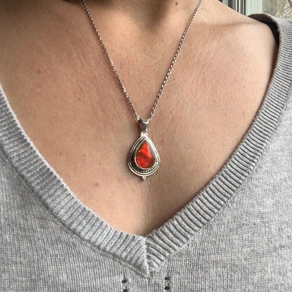 Red ammolite pendant set with sterling silver, red reflection gemstone