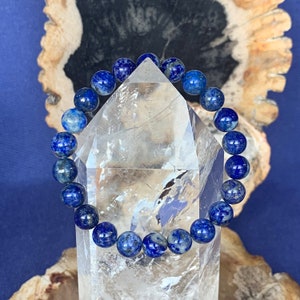 Lapis lazuli bracelet for man&#39;s and woman&#39;s on elastic 8 mm diameter natural color