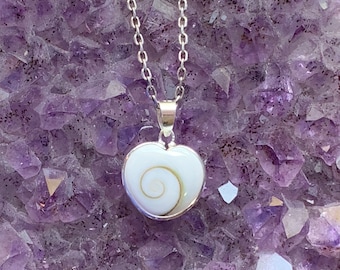 Heart shape Shiva eye or Saint Lucia eye pendant set with sterling silver, natural white Sea shell with a spiral