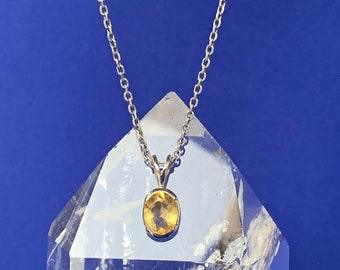 Small faceted citrine pendant set with sterling silver
