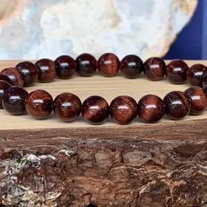 Bull eye bracelet 8 mm on elastic cord for man&#39;s and woman&#39;s red tiger eye natural stone