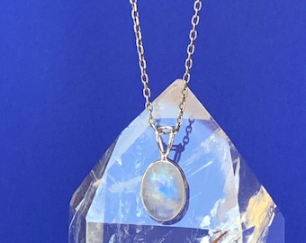 Moonstone pendant set with sterling silver, natural stone with blue reflection