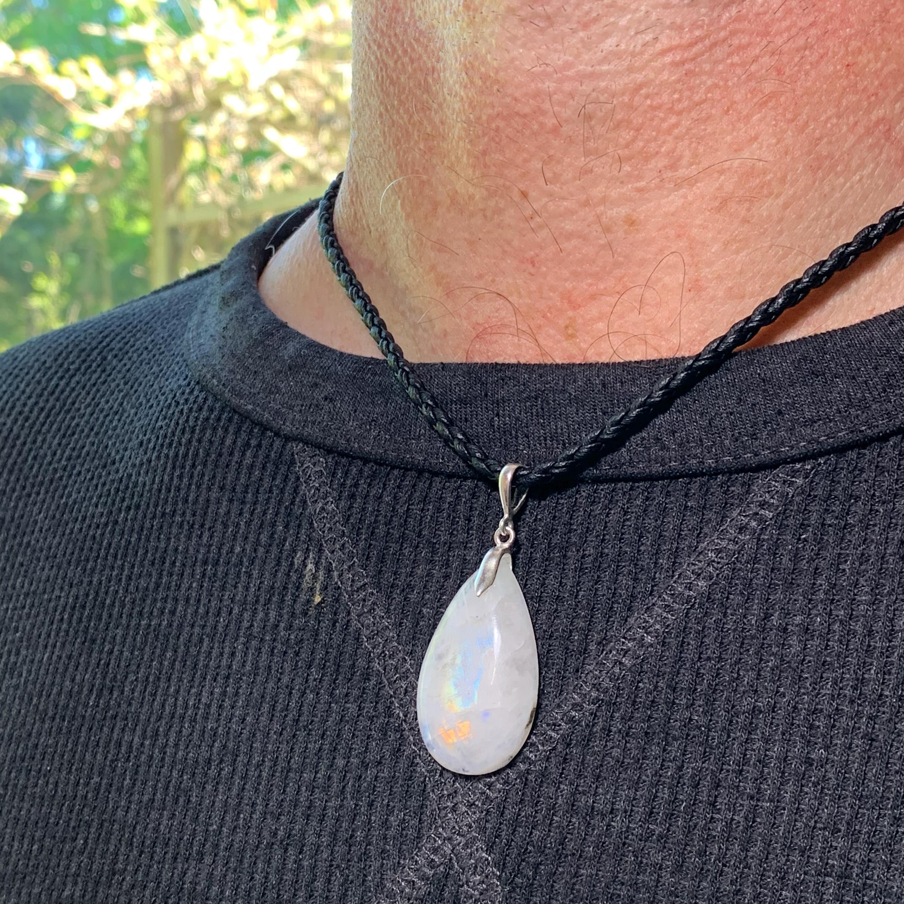 Moonstone necklace on black cord, sterling silver closing, natural gemstone with strong reflection, large stone