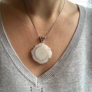 Solar quartz pendant set with sterling silver, natural crystal points