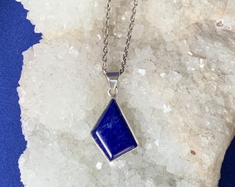 Lapis lazuli pendant set with sterling silver, triangular shape