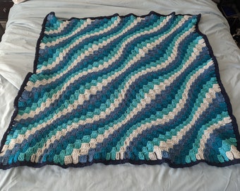 Crocheted Afghan in Blues and Wavy Pattern