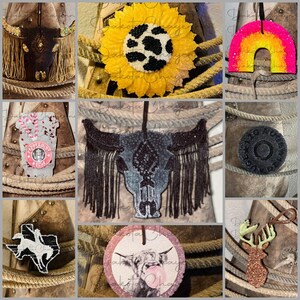 May include: A collage of nine images showcasing various car air fresheners. The images feature a variety of designs, including a sunflower, a rainbow, a bull skull, a cow, a deer, and a coffee cup. The air fresheners are all made of different materials, such as glitter, fabric, and resin.