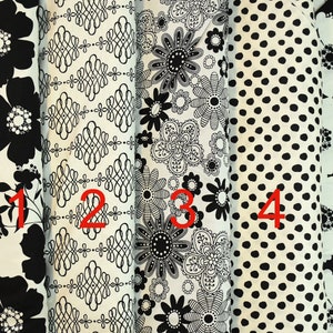 May include: Five different black and white fabric swatches with various patterns. The swatches are numbered 1 through 5.