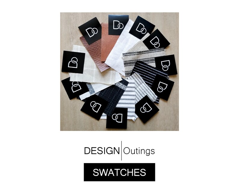May include: A collection of fabric swatches in various colors and patterns, including black and white stripes, brown, and beige. Each swatch has a black square label with a white logo.