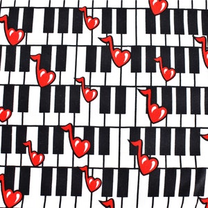 May include: A white and black piano keyboard pattern with red musical notes shaped like hearts. The pattern repeats throughout the image.