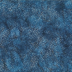 May include: A blue fabric with a white polka dot pattern. The dots are of varying sizes and are scattered randomly across the fabric.