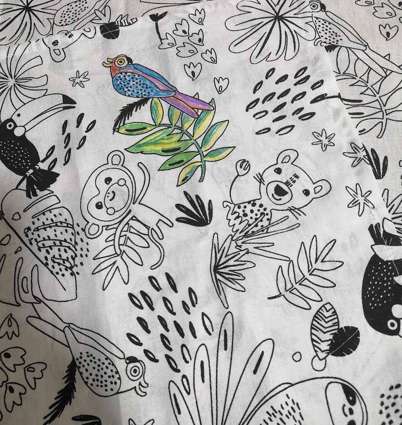 May include: Black and white illustration of a jungle scene with toucans, monkeys, sloths, and other animals. The illustration is on a white background.