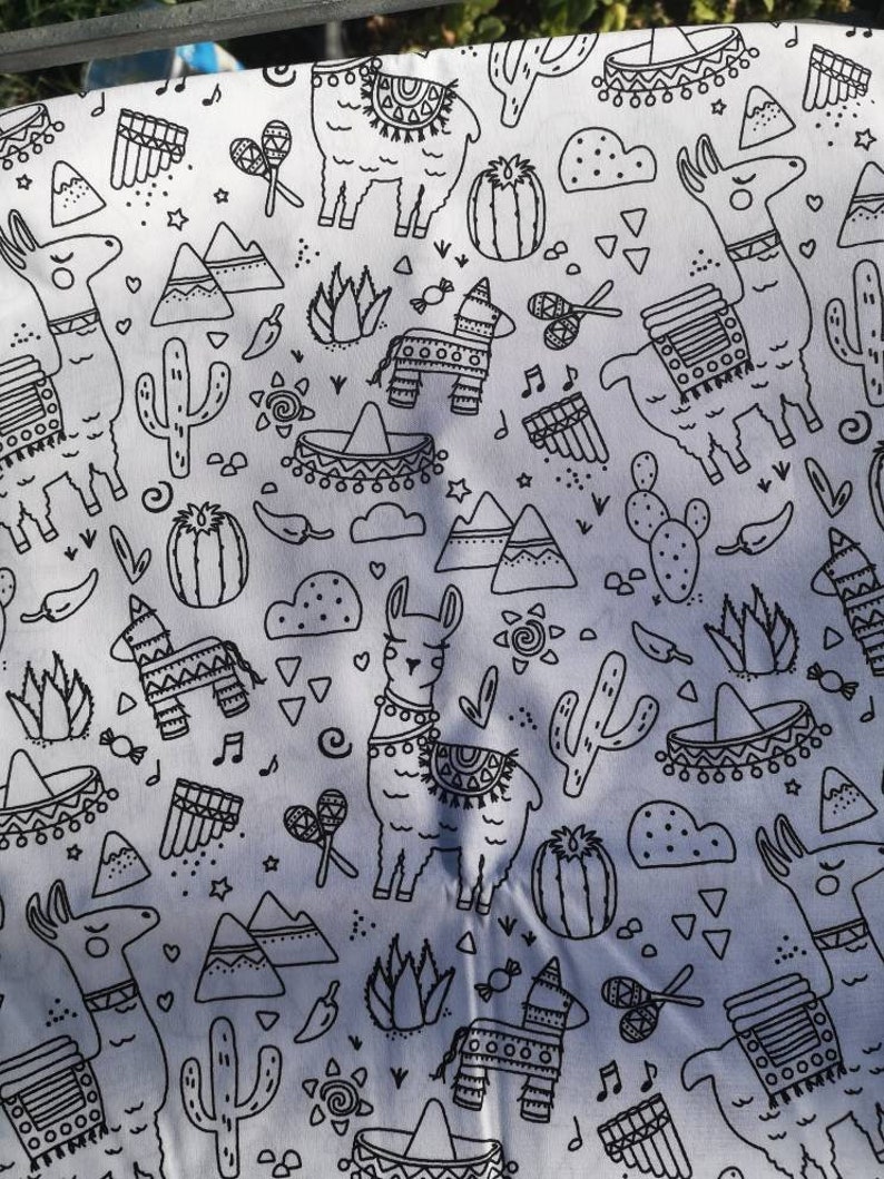 May include: Black and white llama pattern fabric with various designs including cacti, mountains, and musical instruments.