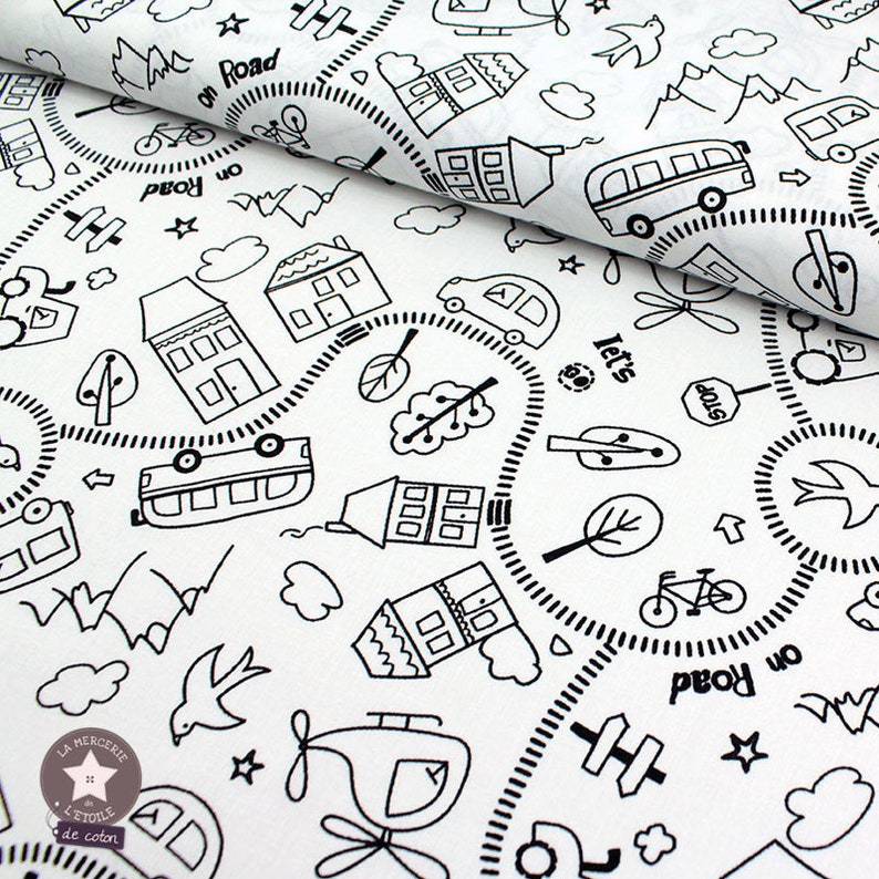 May include: Black and white fabric with a repeating pattern of houses, cars, trees, and other road-related imagery. The text "on Road" appears multiple times.