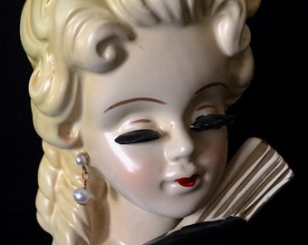 vintage doll head vases