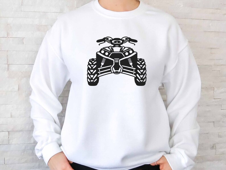 May include: White sweatshirt with a black silhouette of an ATV, or all-terrain vehicle, printed on the front.