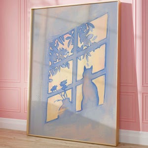 May include: A framed wall art print featuring a blue-toned illustration of a cat sitting on a windowsill. The scene depicts a window with a grid frame, silhouettes of leafy plants, and a small vase with flowers against a soft yellow background.