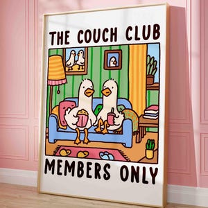 two cute goose sitting on a sofa holding hands (or should I say wings) in a retro looking apartment, funny print for your home decor. the text reads: he couch club members only