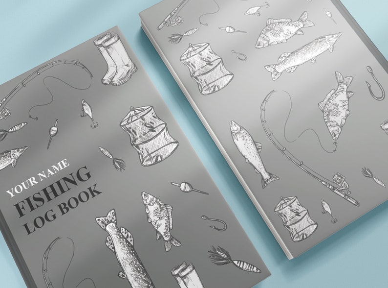 May include: Two gray fishing log books with a variety of fishing-themed illustrations, including fish, fishing rods, and tackle boxes. The text on the cover reads "Your Name Fishing Log Book".