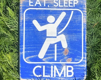 Eat Sleep Climb wooden sign