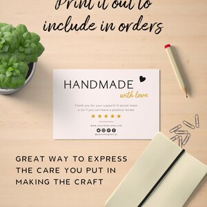 May include: A white card with black text that reads "HANDMADE with love". The card also includes a gold star rating, a website address, and a social media handle. The text below the card reads "GREAT WAY TO EXPRESS THE CARE YOU PUT IN MAKING THE CRAFT".