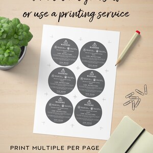May include: A printable sheet with six warning labels for products. Each label has a circle with a warning symbol, the word "WARNING", care instructions, and space for a brand name. The text at the bottom of the sheet reads "PRINT MULTIPLE PER PAGE (SAME OR DIFF DESIGN) A4/LETTER SIZE".
