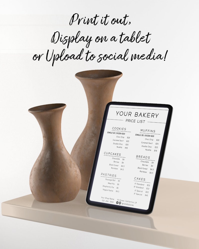 May include: A tablet displaying a bakery menu with prices for cookies, muffins, cupcakes, breads, pastries, and cakes. The menu is on a white surface with two brown ceramic vases.