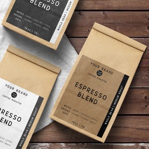 May include: Two brown paper bags with black labels. The labels say "Espresso Blend" and include information about the coffee beans, such as the origin, notes, and roast. The labels also include the brand name "Your Brand" and the text "Coffee Roaster".