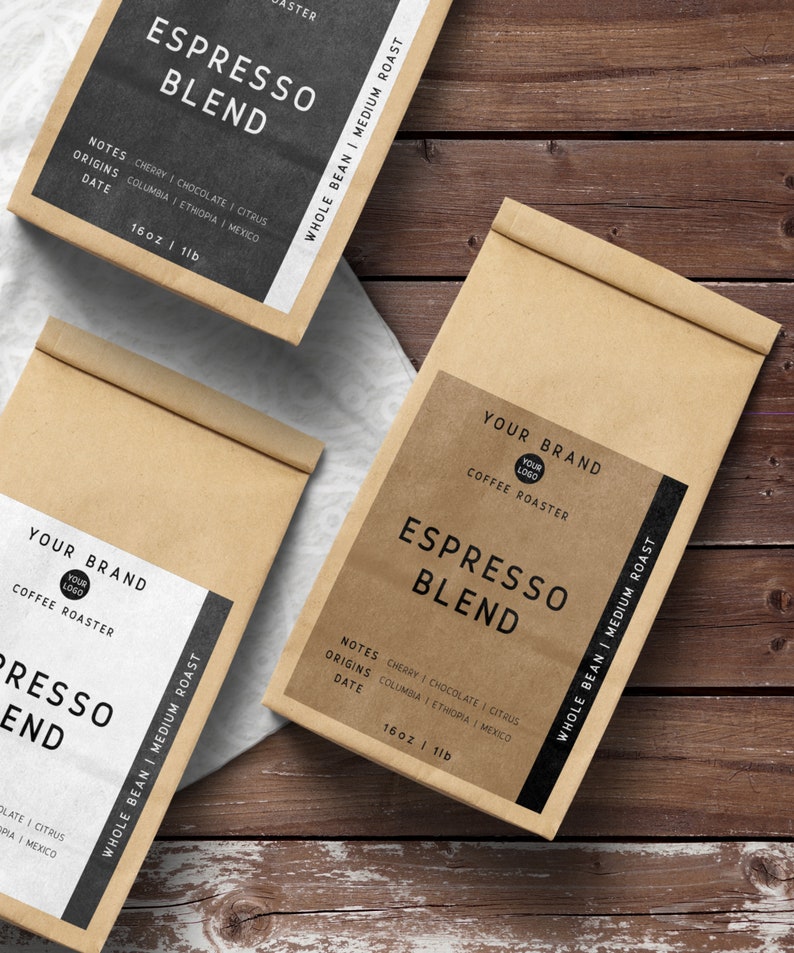 May include: Two brown paper bags with black labels. The labels say "Espresso Blend" and include information about the coffee beans, such as the origin, notes, and roast. The labels also include the brand name "Your Brand" and the text "Coffee Roaster".